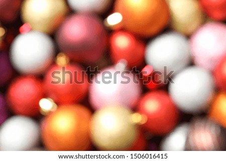 Blurred background of christmas balls. Happy winter holidays