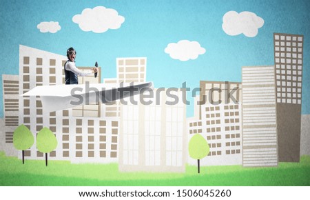 Aircraft pilot flying in paper plane. Aviator driving paper plane on background of city illustration. Cartoon cityscape with high skyscrapers, green grass and trees. Mixed media concept