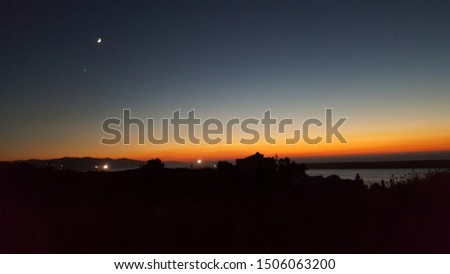 The Moon and the sunset color 