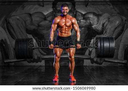 Strong Muscular Men Performing Heavy Deadlift Exercise With Barbells Royalty-Free Stock Photo #1506069980