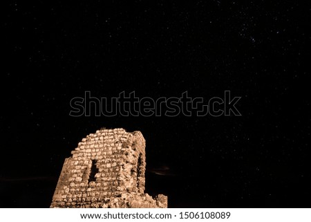 Old Fortress and stars in the night