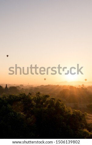 Vertical picture of high contrast sunrise and nature in Bagan, Myanmar