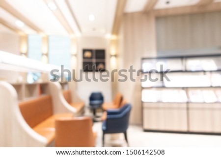 Abstract blur coffee shop cafe interior for background