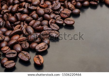  coffee bean on black wood background.                                