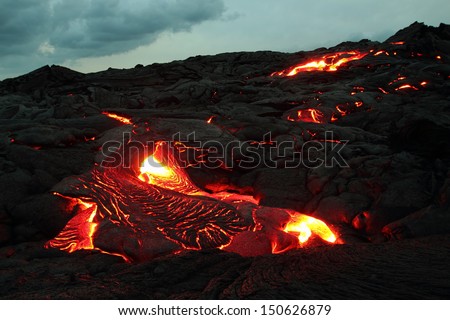 Active lava flowing towards the camera on the Big Island, Hawaii Royalty-Free Stock Photo #150626879