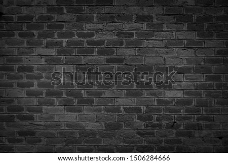 Old brick black color wall. Vintage background Royalty-Free Stock Photo #1506284666