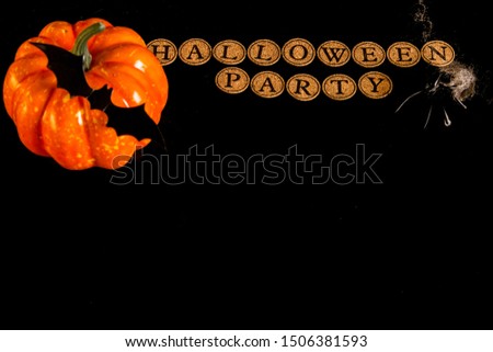 Halloween background. Lettering, bat, pumpkin and spider. The inscription "happy halloween" on a black background. Place for text.