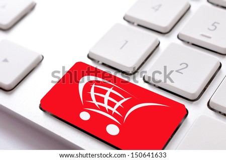 Red button on keyboard with trolley