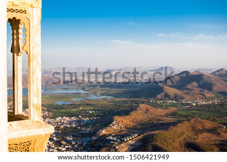 Aerial view from the Monsoon Palace (Sajjan Garh Palace) on Aravalli mountains near Udaipur , 
 Rajasthan, India