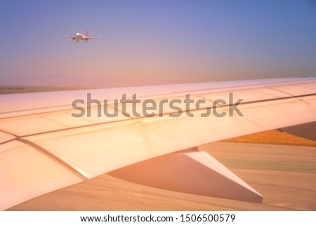 Wing of an airplane waiting to take off. Photo applied to tourism operators. picture for add text message or frame website. Traveling concept