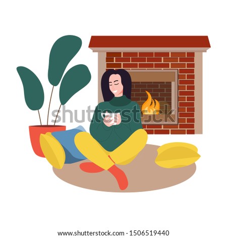 A girl sitting and drinking a cup of hot tea or coffee near fireplace on rug. Colorful vector illustration in flat style.