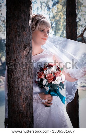 portrait of a blonde bride girl in a wedding dress
