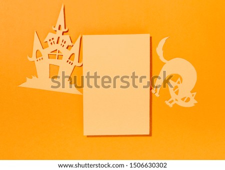 Blank sheet with paper cat and castle