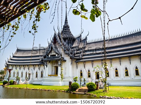 Amazing view of beautiful Sanphet Prasat Palace with reflection in the water. Location: Ancient City Park, Muang Boran, Samut Prakan province,  Bangkok, Thailand. Artistic picture. Beauty world.
