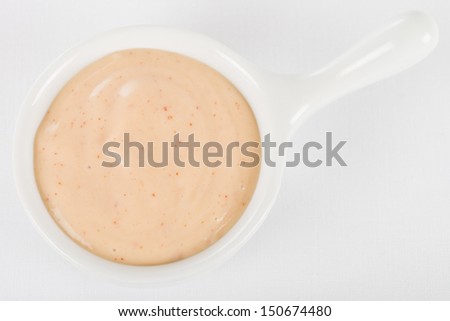 Rose Sauce / Fry Sauce Dip - Bowl of dipping sauce made with ketchup and mayonnaise. Shot from above on a white background. 