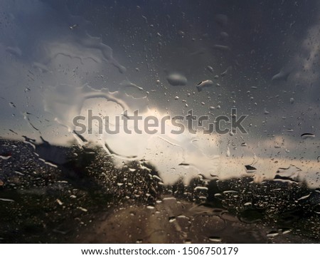 Driving a car on a rainy afternoon, Krakow, Poland