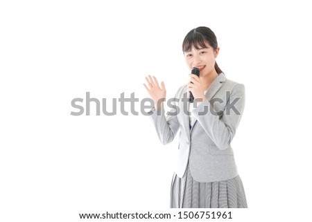 Young business woman talking with mic