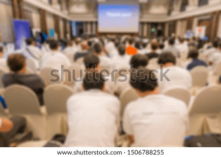 Blurred of people in meeting conference hall 