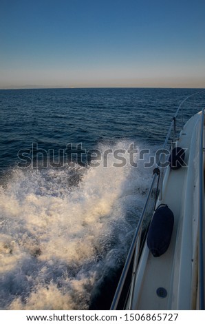 Summer morning traveling by yacht in the Saronic Gulf, Greece.