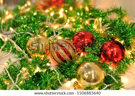 Shiny Christmas Xmas New Year decorations sparkling decor with shines lights. Beautiful Christmas picture background. Winter holidays decor festive. Luminous, light, bright, brilliant, shiny, shining.