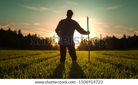 farmer checking out his crop. Royalty-Free Stock Photo #1506914723