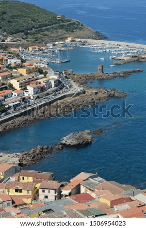 aerial view of the Castelsardo harbor, in the northern Sardinia, on a sunny summer day
