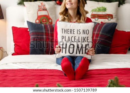 Merry Christmas and Happy Holidays. Young couple celebrating Christmas at home. Winter holiday concept