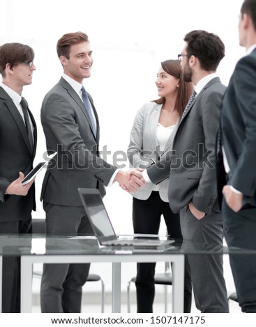 business team and handshake of business partners