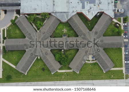 aerial veiw from a drone of unique housing units connected in the middle