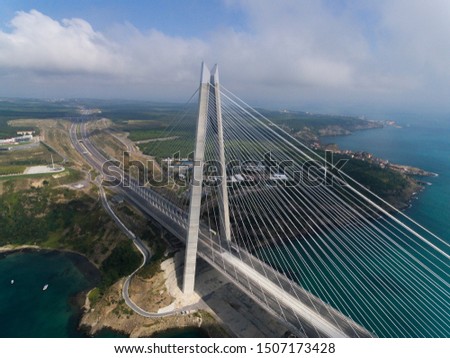 Turkey, Istanbul, Yavuz Sultan Selim Bridge and Cargo Ship Aerial Photo