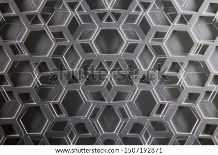 Collage photo of drop ceiling panels with polygonal pattern. Abstract modern architecture of office building interior fragment. Geometric background with cellular composition in black and white.