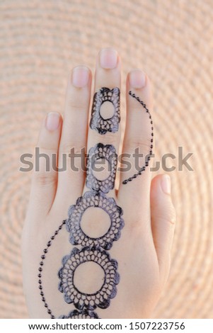 henna back hand tattoo designs