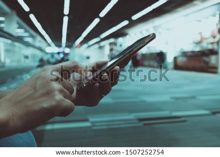 Women hand using smartphone background. Social media maketing concept.