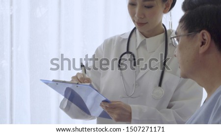 Doctor or physician take care of sick patient at the hospital or medical clinic. The happy patient visit doctor and discuss for illness cure treatment. Medical healthcare and doctor service concept.