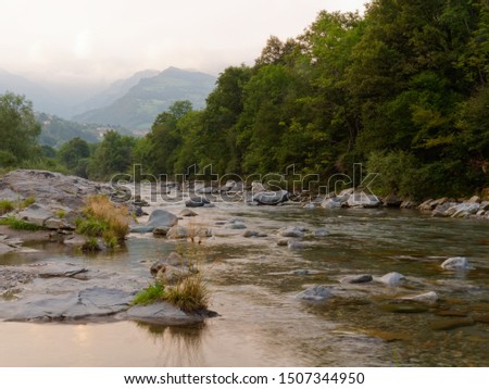 mountain river at sunset in the mountains of italy