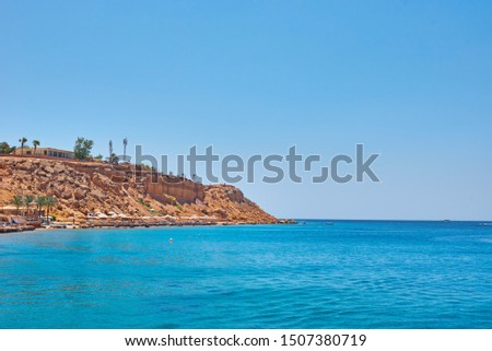 Beautiful view of the sea cost against blue sky
