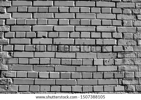 Brick wall in black and white.