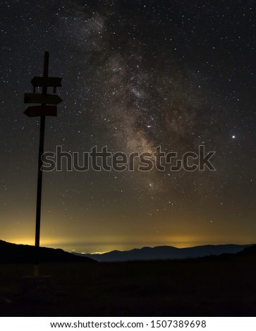 The milky way. Night stars landscape mountain view.