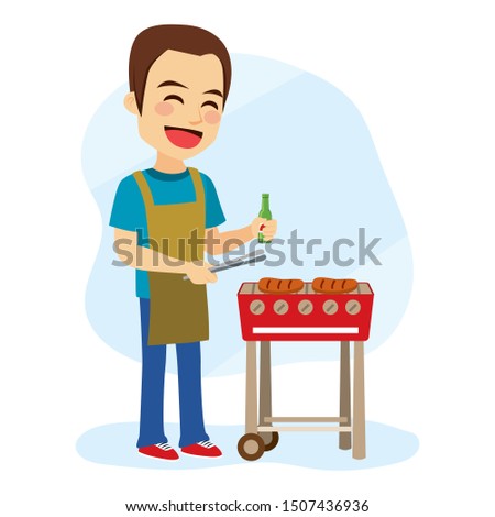 Young caucasian cheerful man cooking hamburger on barbecue grill