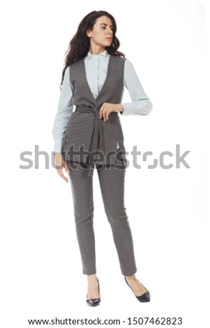indian business woman in woolen official vest with belt trousers high heels shoes full body photo isolated on white