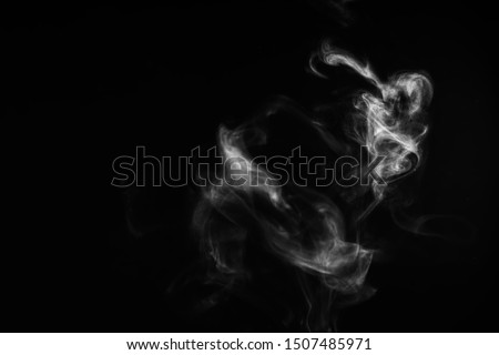 White natural steam smoke effect on solid black background with abstract blur motion wave swirl use for overlay in pollution, vapor cigarette, gas, dry ice, warm hot food, boil water smoke concepts Royalty-Free Stock Photo #1507485971