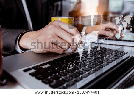 Business documents on office table with laptop and digital tablet and graph financial with social network interface icons.