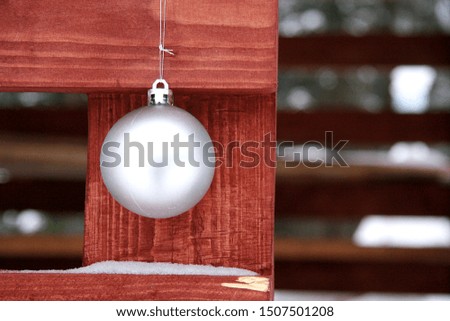 Photo of a Christmas ball in winter