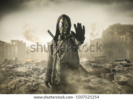 man in gas mask says stop the destruction in the world. , post Apocalypse Royalty-Free Stock Photo #1507521254