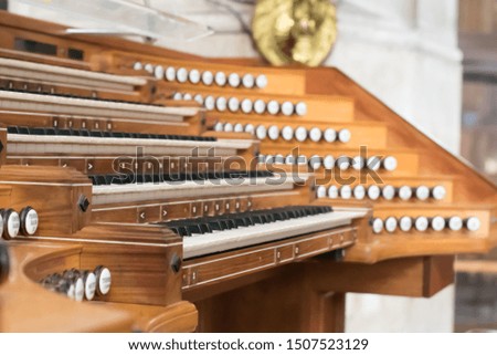 Instrument organ, keyboard, buttons of two parts