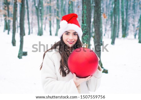 Christmas winter girl outdoor portrait. What happens during winter season. Winter emotion. Snowing winter beauty fashion concept