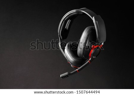 beautiful gaming headphones on background