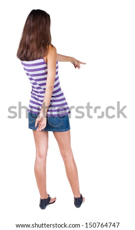 Back view of  pointing woman. beautiful brunette  girl.  Rear view people collection.  backside view of person.  Isolated over white background.
