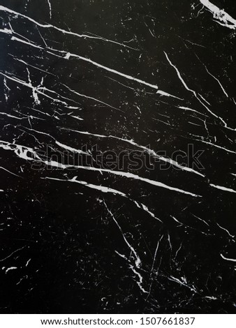 black ceramic tile with marble pattern