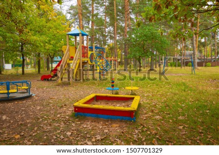 Empty playground in the autumn park